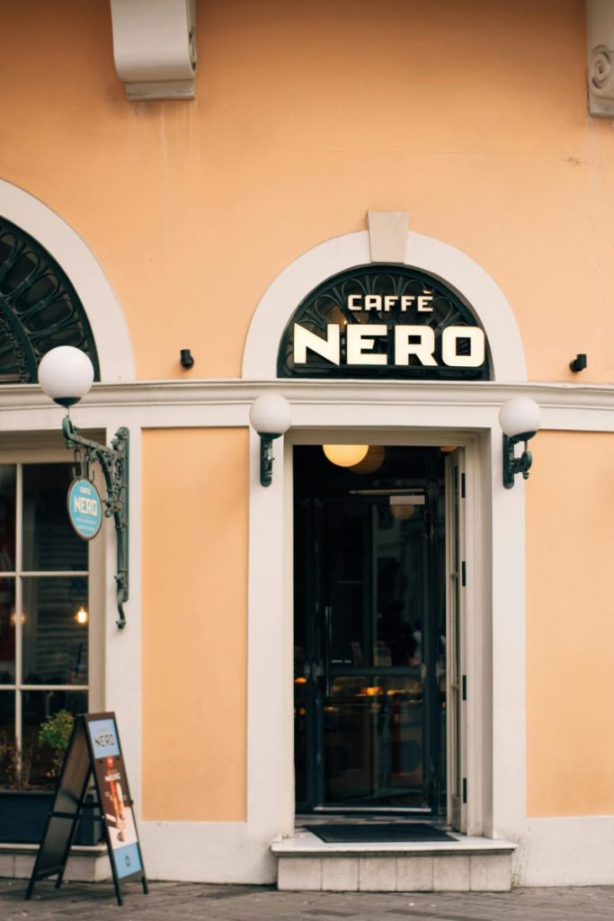 Charming view of the Caffe Nero storefront, showcasing classic architecture.